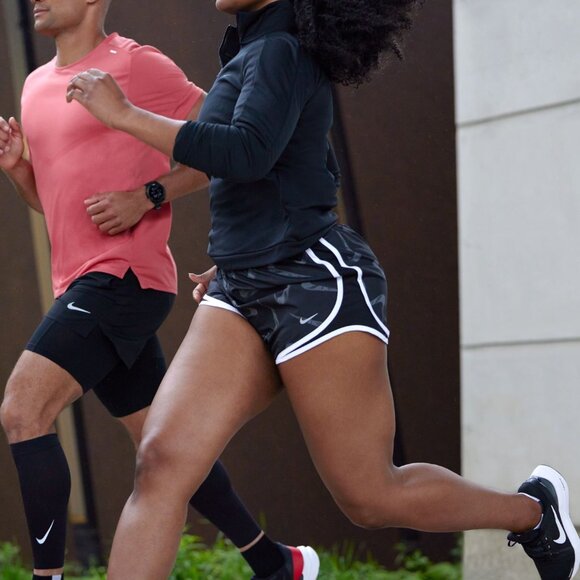Nike Women's Run Dri-FIT Tempo Swoosh All Over Print Shorts - Picture 1 of 11